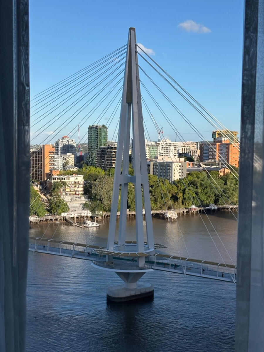 A view of a pedestrian footbridge across the Brisbane River.